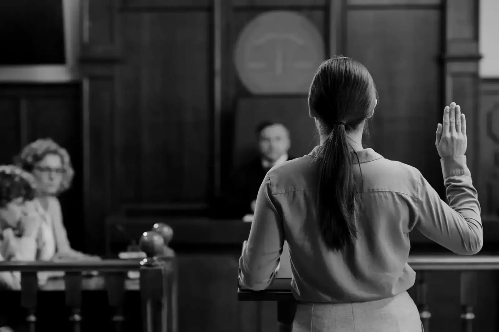 Witness taking the oath before a judge in a Texas courtroom